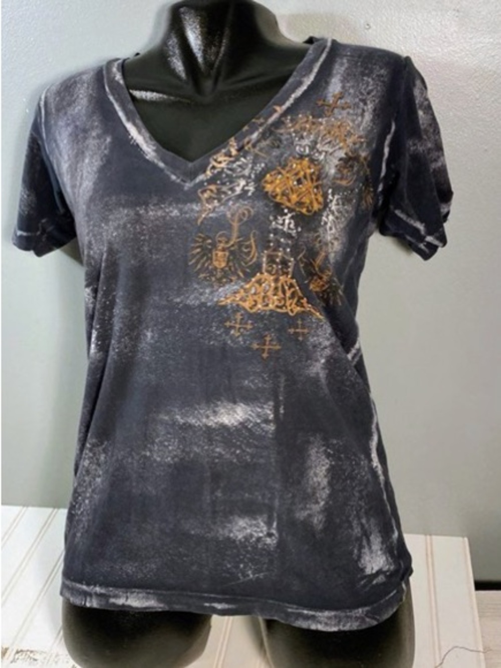 Affliction Women's Distressed Black V‑Neck Tee with Gold Emblem